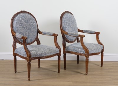 Lot 938 - A PAIR OF LOUIS XVI STYLE STAINED BEECH OPEN ARMCHAIRS (2)