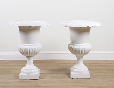Lot 970 - A PAIR OF LATE 19TH CENTURY CAST IRON SEMI FLUTED JARDINIERES (2)