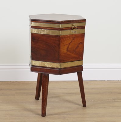Lot 750 - A GEORGE III BRASS BOUND MAHOGANY OCTAGONAL CELLARETTE