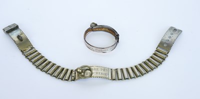 Lot 562 - A SMALL ENGLISH SILVER-PLATED DOG COLLAR (2)