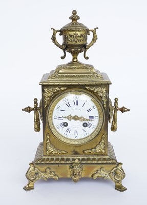 Lot 584 - A FRENCH GILT-BRASS MANTEL CLOCK