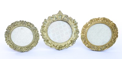 Lot 585 - THREE FRENCH ORMOLU FOLIATE RELIEF CAST PORTRAIT FRAMES (3)