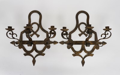 Lot 646 - A PAIR OF GILT DECORATED WROUGHT IRON THREE LIGHT WALL SCONCES (2)