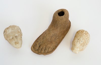 Lot 819 - A ROMAN STYLE TERRACOTTA MODEL OF A LEFT FOOT (3)