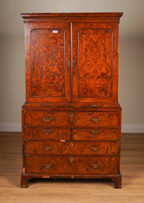 Lot 1000 - A GEORGE II BURR WALNUT SECRETAIRE CABINET-ON-CHEST