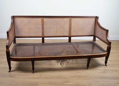 Lot 1047 - A LATE 19TH CENTURY GEORGE III STYLE MAHOGANY FRAMED BERGERE SOFA