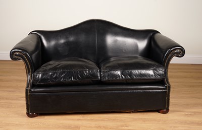 Lot 1062 - A STUDDED BLACK LEATHER UPHOLSTERED HUMP BACK TWO SEATER SOFA