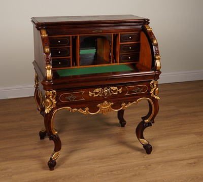 Lot 1160 - A LATE 19TH CENTURY ITALIAN PARCEL-GILT ROSEWOOD CYLINDER BUREAU