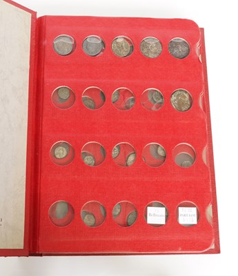 Lot 1530 - A COLLECTION OF COINS CONTAINED IN A RED COIN LIBRARY