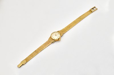Lot 1704 - AN OMEGA LADY'S GOLD  BRACELET WRISTWATCH