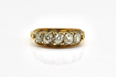 Lot 1804 - A GOLD AND DIAMOND SET FIVE STONE RING