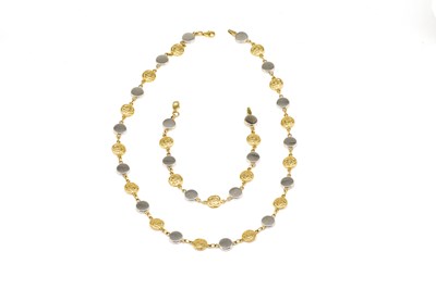 Lot 1826 - A 10 CT GOLD CELTIC DESIGN NECKLACE AND A MATCHING BRACELET