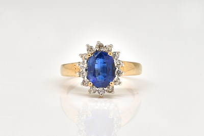 Lot 1854 - A 9CT GOLD SAPPHIRE CLUSTER RING