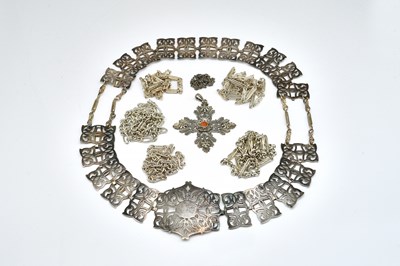 Lot 1855 - A COLLECTION OF SILVER CHAINS, A SILVER PLATED BELT AND A SILVER PENDANT CROSS (8)