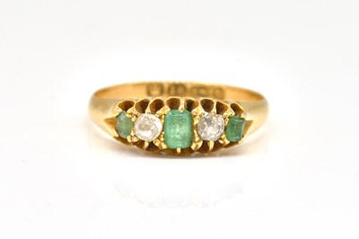 Lot 1924 - AN 18CT GOLD VICTORIAN EMERALD AND DIAMOND FIVE STONE RING