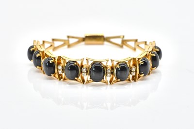 Lot 1957 - WITHDRAWN A GOLD, BLACK SAPPHIRE AND DIAMOND BRACELET